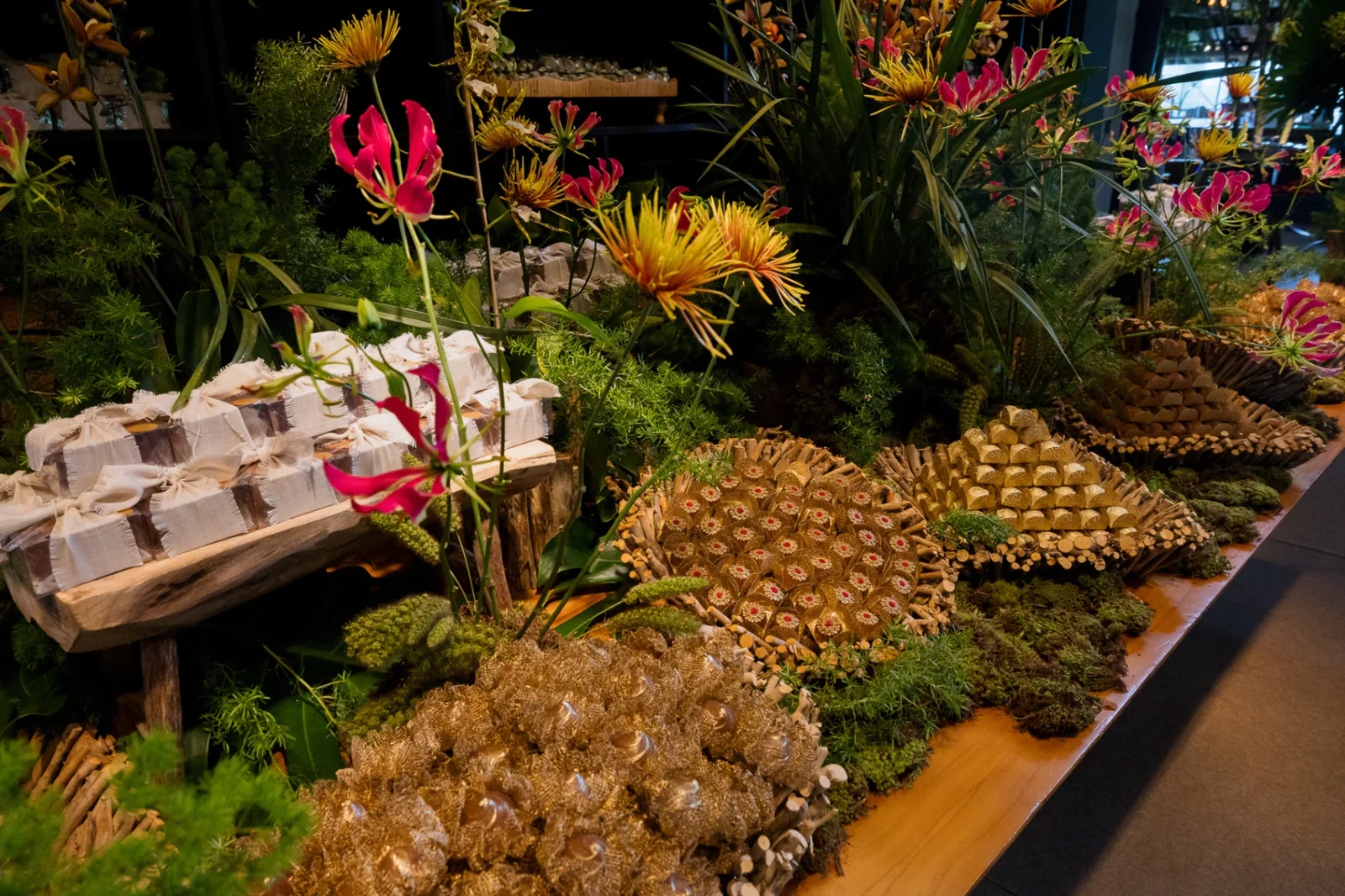 The full dessert table with vibrant florals