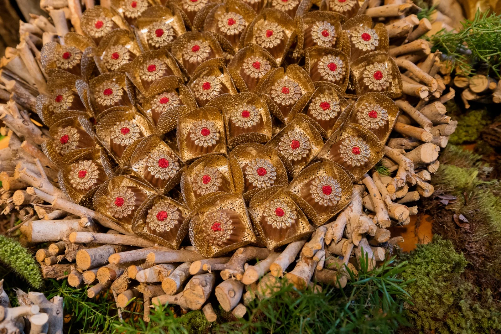 Decorated bonbons on rustic branches