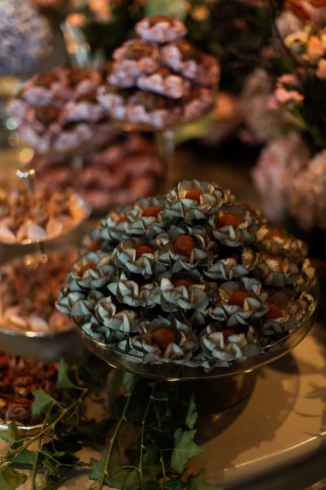Confections in light blue cups showcased on the table