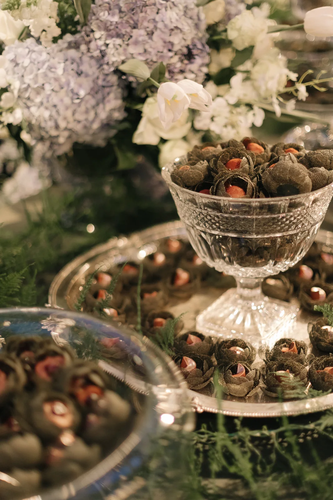 Chocolates in crystal dishes on a silver tray