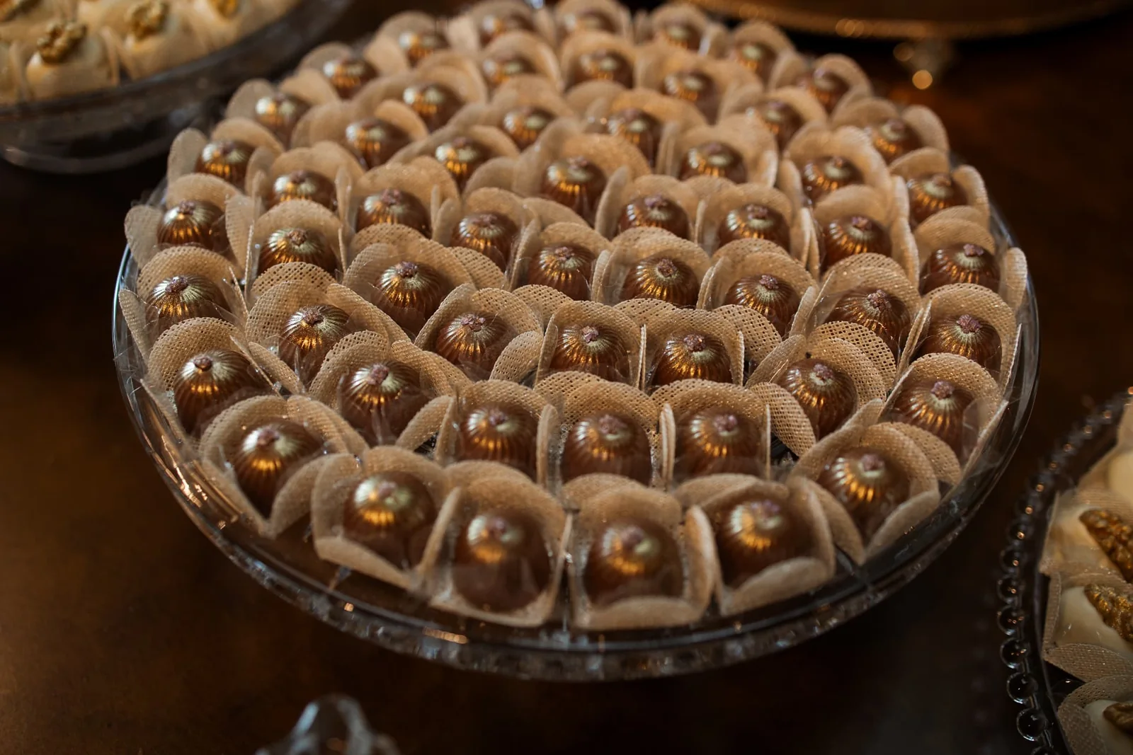 Lebbeke pearlized bonbons arranged on a crystal plate