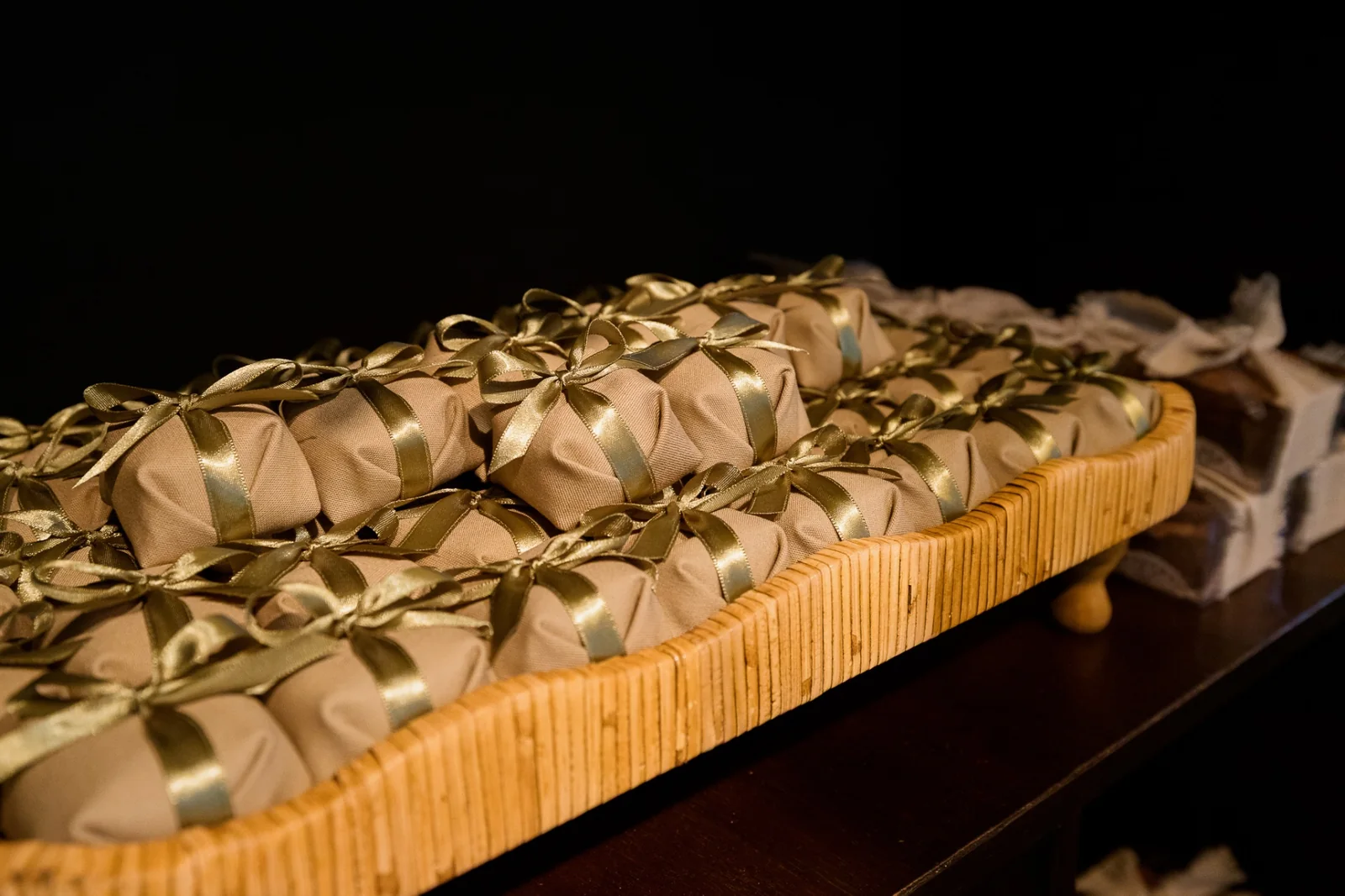 Bem-casados wrapped with gold ribbons