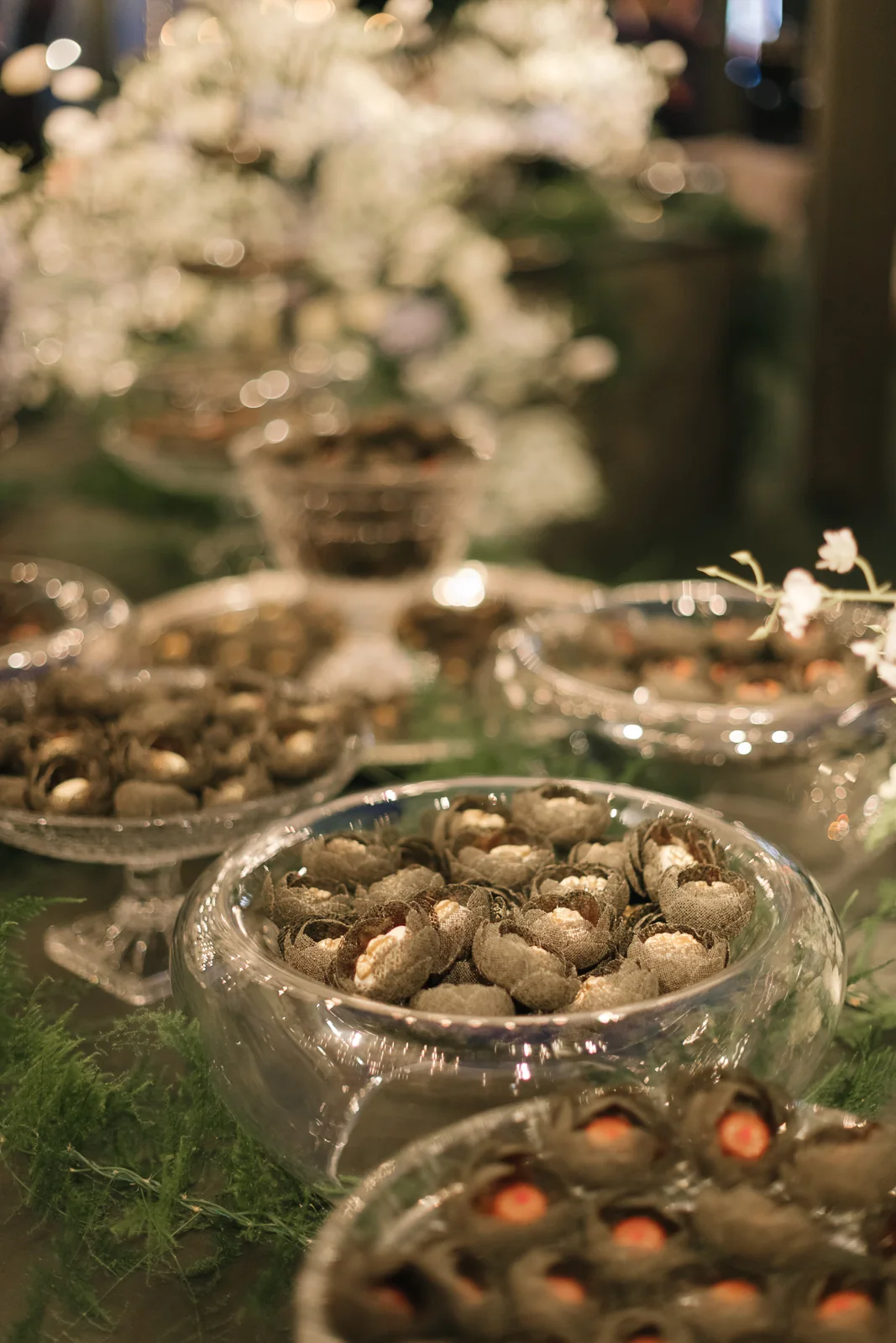 Fine sweets served in crystal glasses and bowls